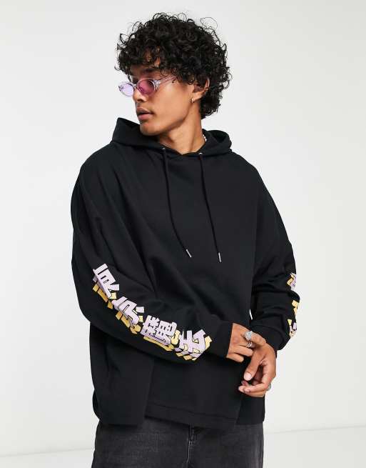 ASOS DESIGN extreme oversized hoodie with cartoon back and sleeve print in black