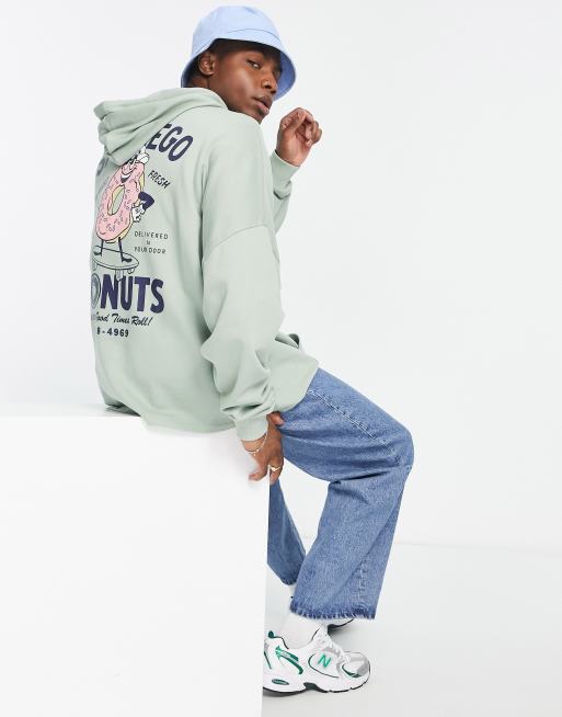 ASOS DESIGN extreme oversized hoodie with cartoon skate back print in green