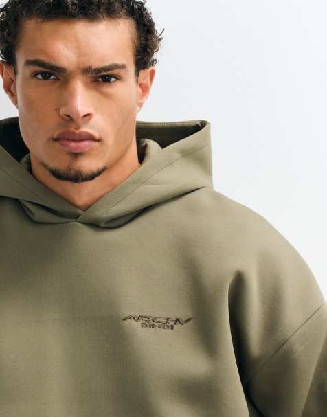 ASOS DESIGN extreme oversized hoodie with embroidered logo print in green scuba-style fabric - view 1