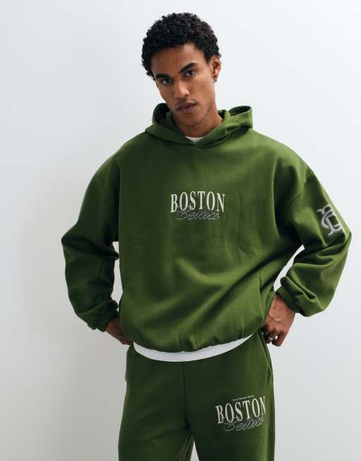 ASOS DESIGN co-ord extreme oversized hoodie and straight leg jogger with NBA Boston Celtics print in Green, 2 of 3