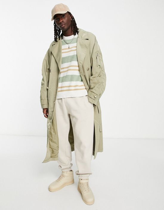 https://images.asos-media.com/products/asos-design-extreme-oversized-nylon-trench-coat-with-ma1-pocket-and-rouching-detail-in-sage/203133525-4?$n_550w$&wid=550&fit=constrain