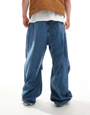 ASOS DESIGN extreme oversized parachute jeans with tuck details in blue wash 