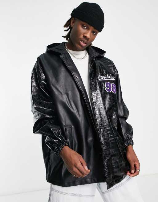 ASOS DESIGN extreme oversized splice varsity coach jacket in black