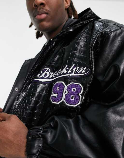 ASOS DESIGN extreme oversized splice varsity coach jacket in black