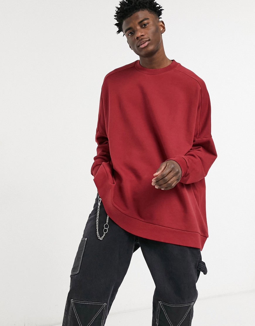 ASOS DESIGN extreme oversized sweatshirt in burgundy-Red