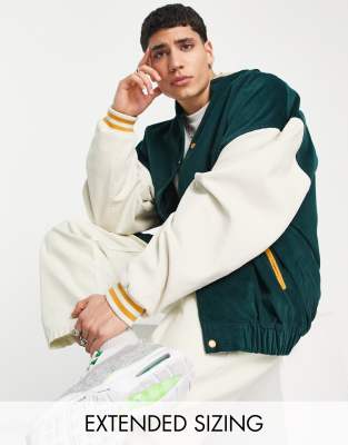 ASOS DESIGN oversized varsity bomber jacket in green and ecru cotton