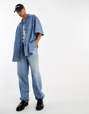 ASOS DESIGN extreme oversized washed denim skater shirt-Blue