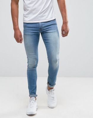 ASOS DESIGN - Extreme superskinny jeans met lichte wassing-Blauw