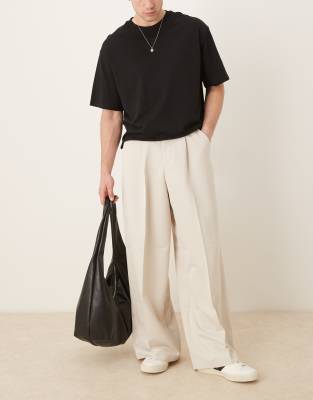 ASOS DESIGN extreme wide leg dress pants with front pleats in stone-Neutral