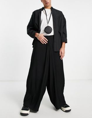 ASOS DESIGN extreme wide leg plisse smart trousers in black