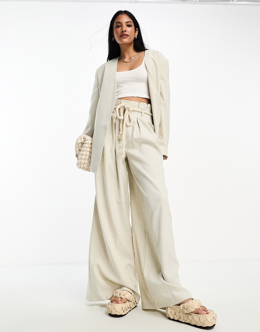 ASOS DESIGN extreme wide leg suit trouser with paperbag waist and rope belt in natural-Neutral