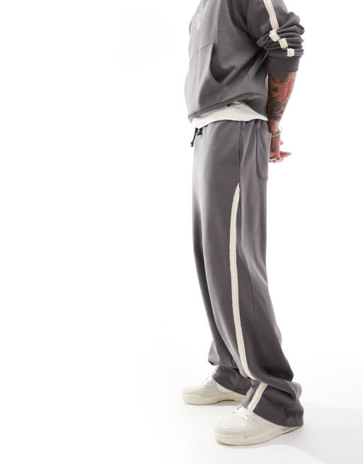 ASOS DESIGN extreme wide leg sweatpants with slanted side tape with text print in charcoal, 3 of 5