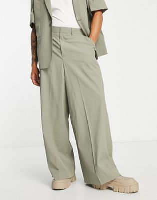 ASOS DESIGN extreme wide suit trousers in micro seersucker in sage green
