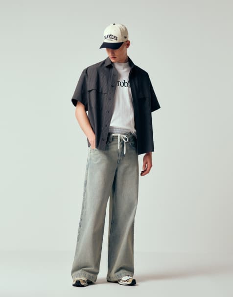 ASOS DESIGN extremt baggy jeans i ljusblå tvätt med broderad bakficka - view 1