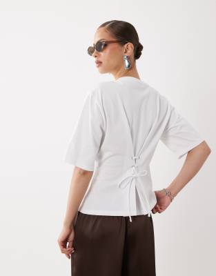 ASOS DESIGN eyelet lace up back cinched T-shirt in white white 7290₽
