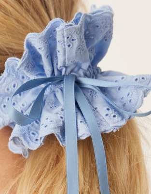 Asos Design Eyelet Scrunchie With Ribbon Detail In Blue