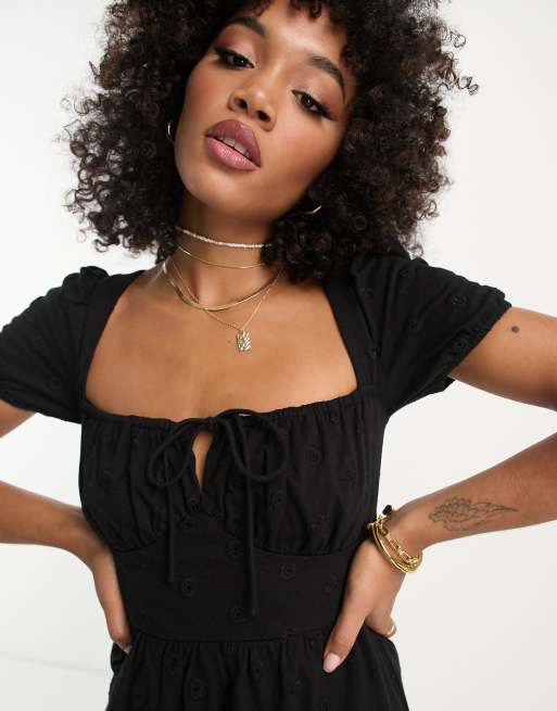 ASOS Design eyelet short sleeve mini tea dress with ruched bust in Black