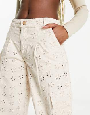 TENACITY : Wide leg pants with stud and eyelet decoration