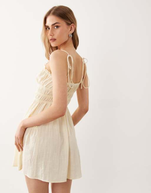 ASOS DESIGN – Faith – Citrongul, smockad sommarklänning i minilängd för stranden, 4 av 4