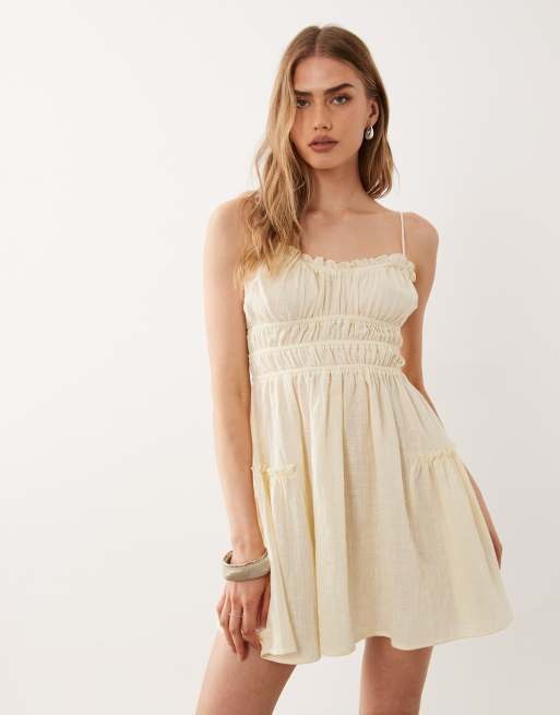 ASOS DESIGN - Faith - Prendisole corto da spiaggia arricciato color limone