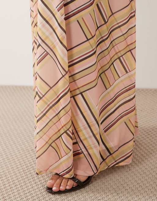 ASOS DESIGN - Falda larga elástica con estampado geométrico a rayas y bajo de corte amplio, 3 de 5