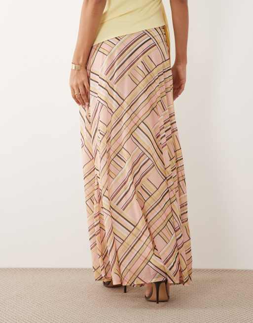 ASOS DESIGN - Falda larga elástica con estampado geométrico a rayas y bajo de corte amplio, 4 de 5