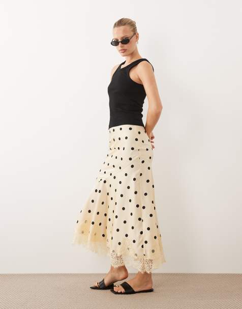 ASOS DESIGN - Falda larga multicolor de corte sirena con estampado de lunares y bajo de encaje - view 1