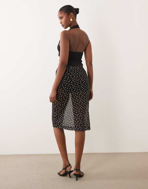 ASOS DESIGN - Falda midi negra transparente con estampado de lunares de malla, 5 de 5