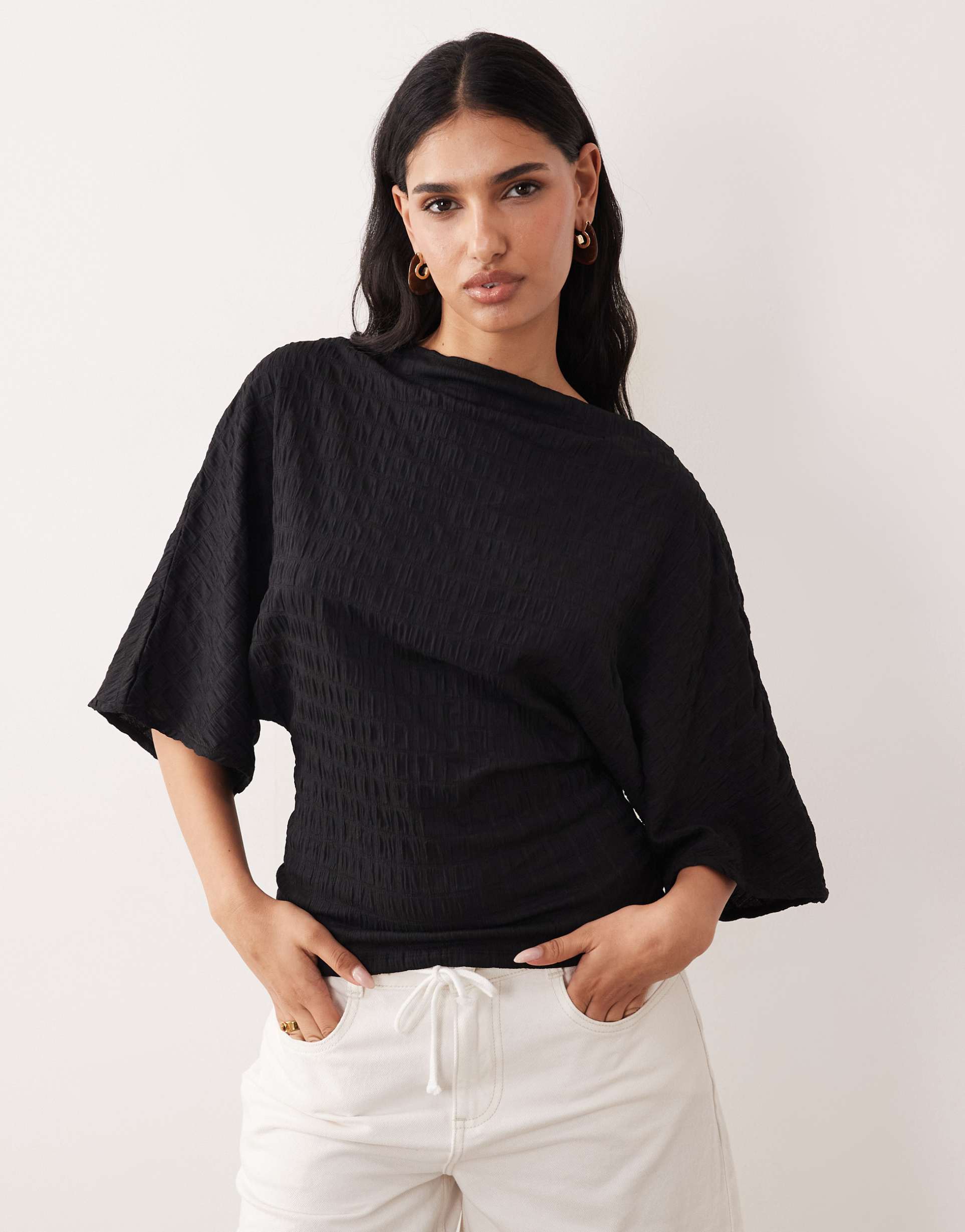asos design fallen shoulder textured top with cinched waist in black