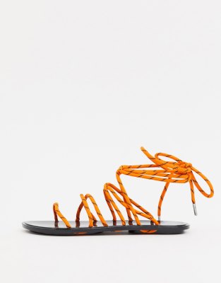 orange and black sandals