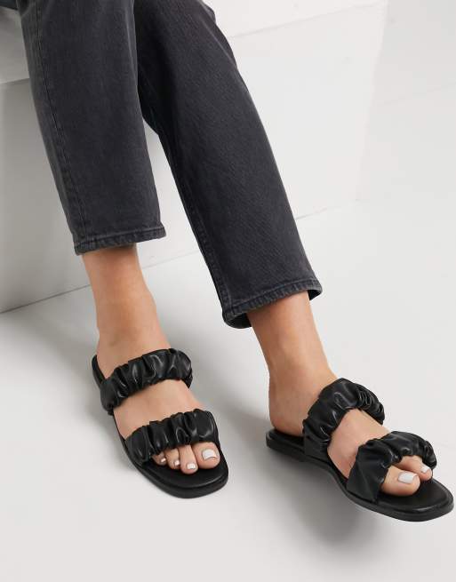 Flat hot sale ruffle sandals