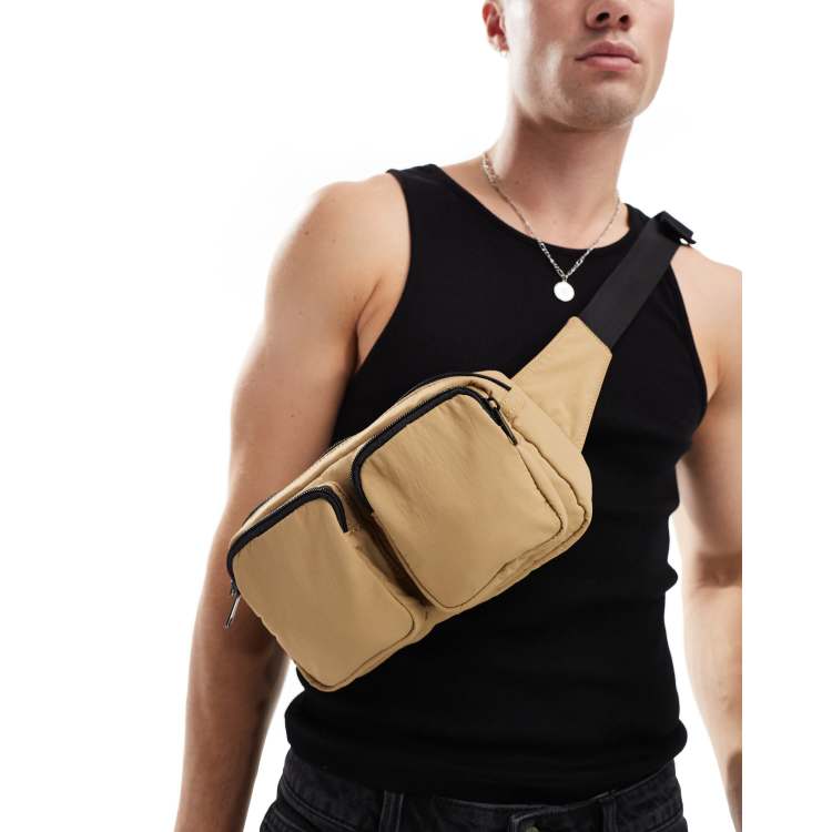 ASOS DESIGN fanny pack with pocket detail in camel ASOS