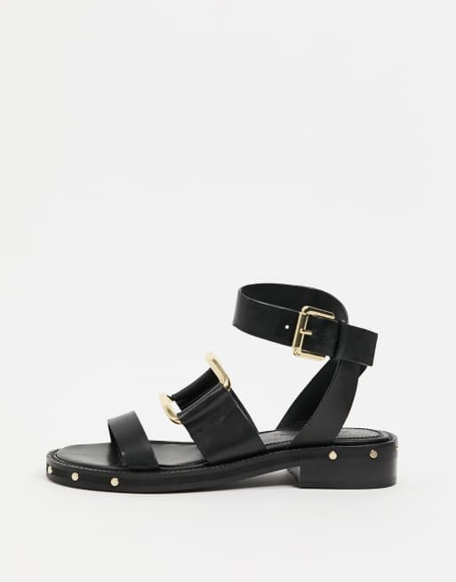 ASOS DESIGN - Farley - Sandali bassi premium neri in pelle con suola spessa e borchie