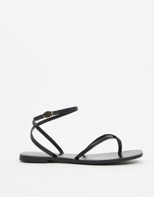 black flat flip flops