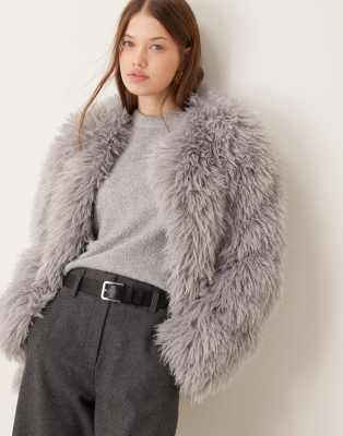 faux fluffy fur jacket in gray-White