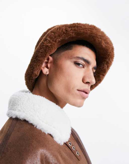 ASOS DESIGN trapper hat with badge in brown faux fur