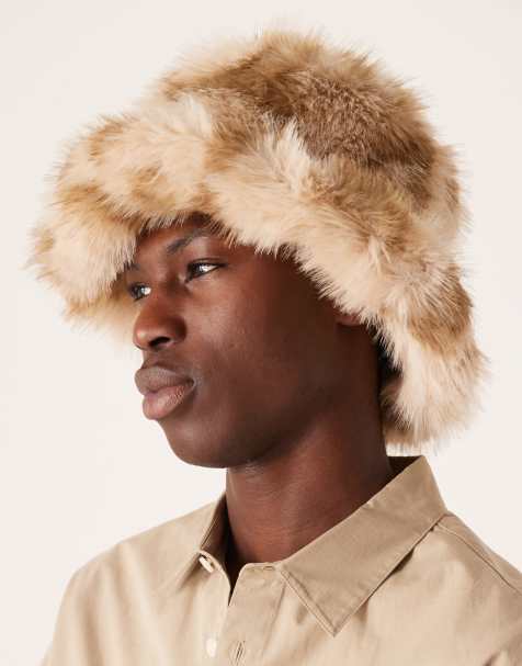 ASOS DESIGN faux fur bucket hat in cow print - view 1