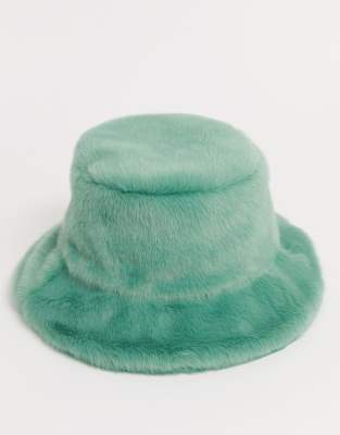 green fur hat