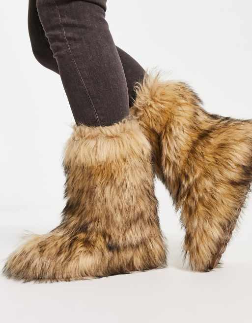 All over faux outlet fur boots