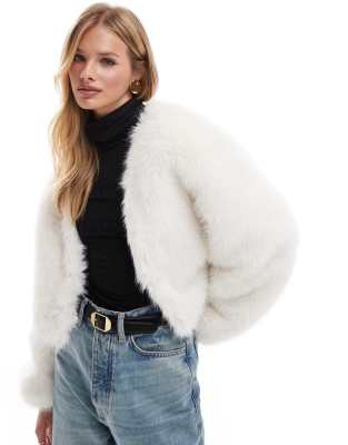 faux fur jacket in cream-White