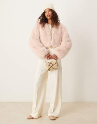 faux fur jacket in light pink