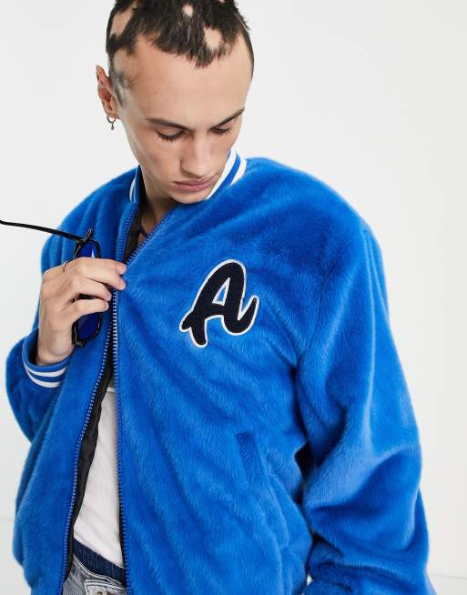 ASOS DESIGN faux fur varsity bomber jacket in blue