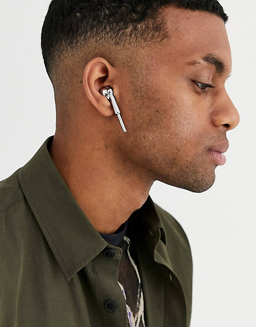 ASOS DESIGN faux headphone ear piece in silver tone