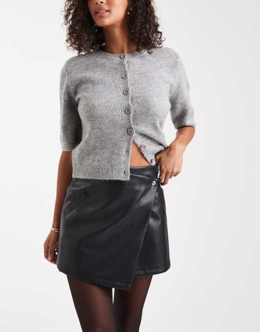 ASOS DESIGN faux leather asymmetric wrap mini skirt in black, 2 of 5