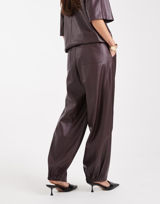 ASOS DESIGN faux leather barrel leg pull-on pants in plum - part of a set