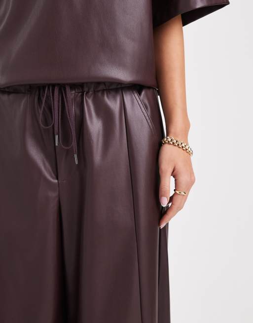 ASOS DESIGN faux leather barrel leg pull-on pants in plum - part of a set