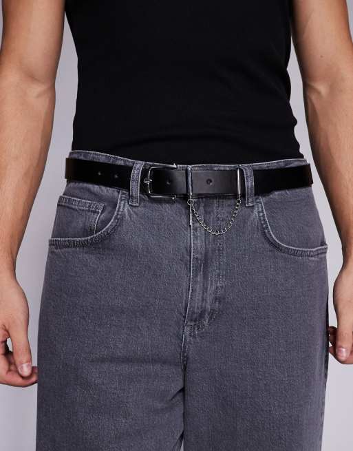 ASOS DESIGN faux leather belt with cross and chain attachment in black, 3 of 3