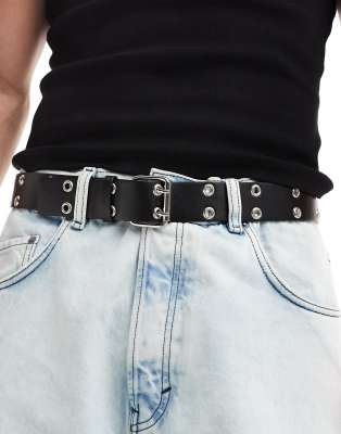 faux leather belt with roller buckle and eyelets in black