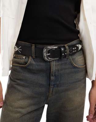 faux leather belt with stud pattern and western buckle in black