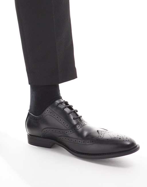 ASOS DESIGN faux leather brogue shoes in black